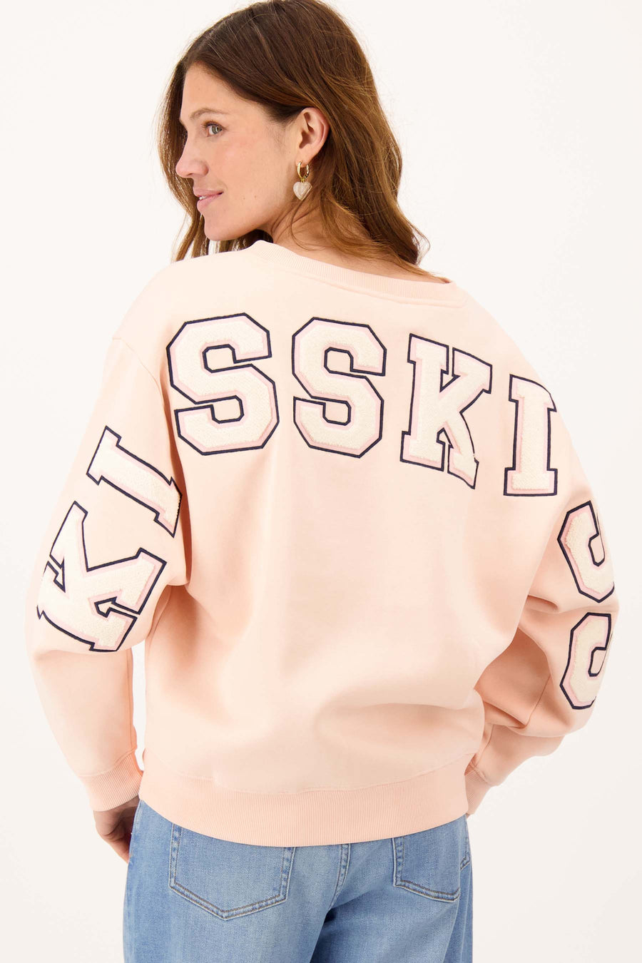 V hals sweater met tekst kiss kiss | light pink
